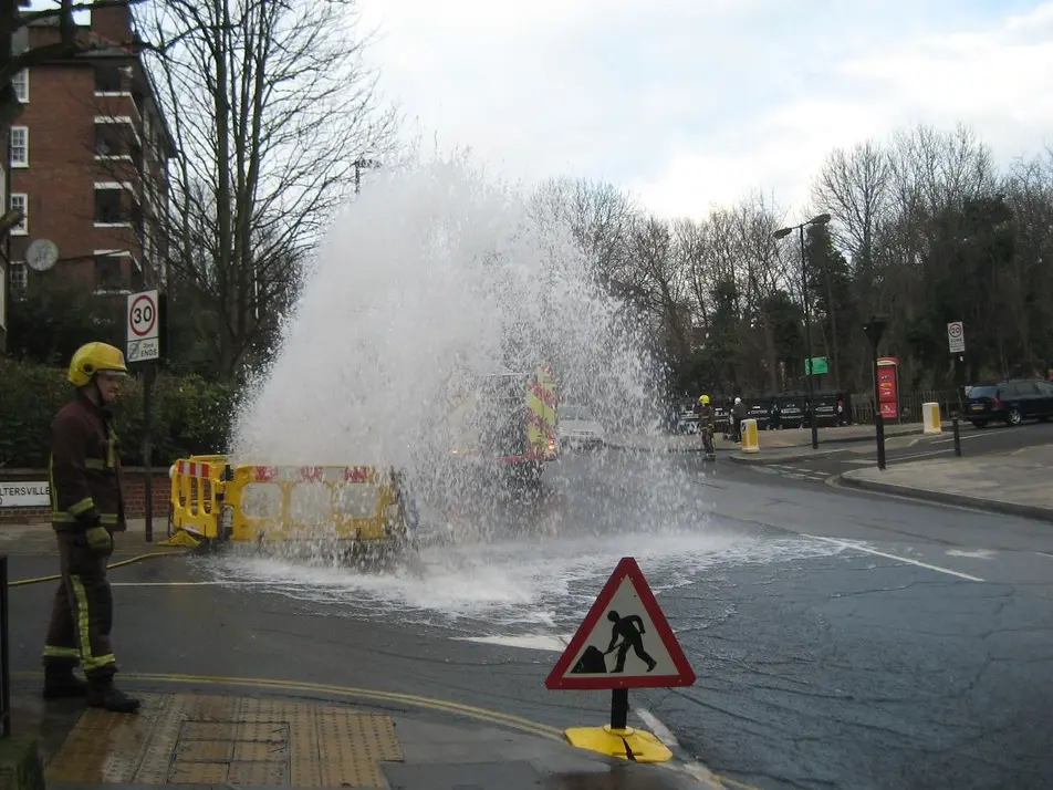 Water line work at the street — trench and mains