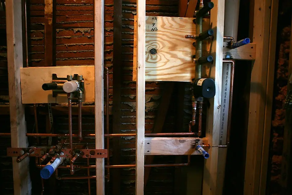 Rough-in plumbing during construction